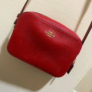 Small size 4(L)x 7(W) , Coach Brand, Red crossbody bag. Great for any outing!
